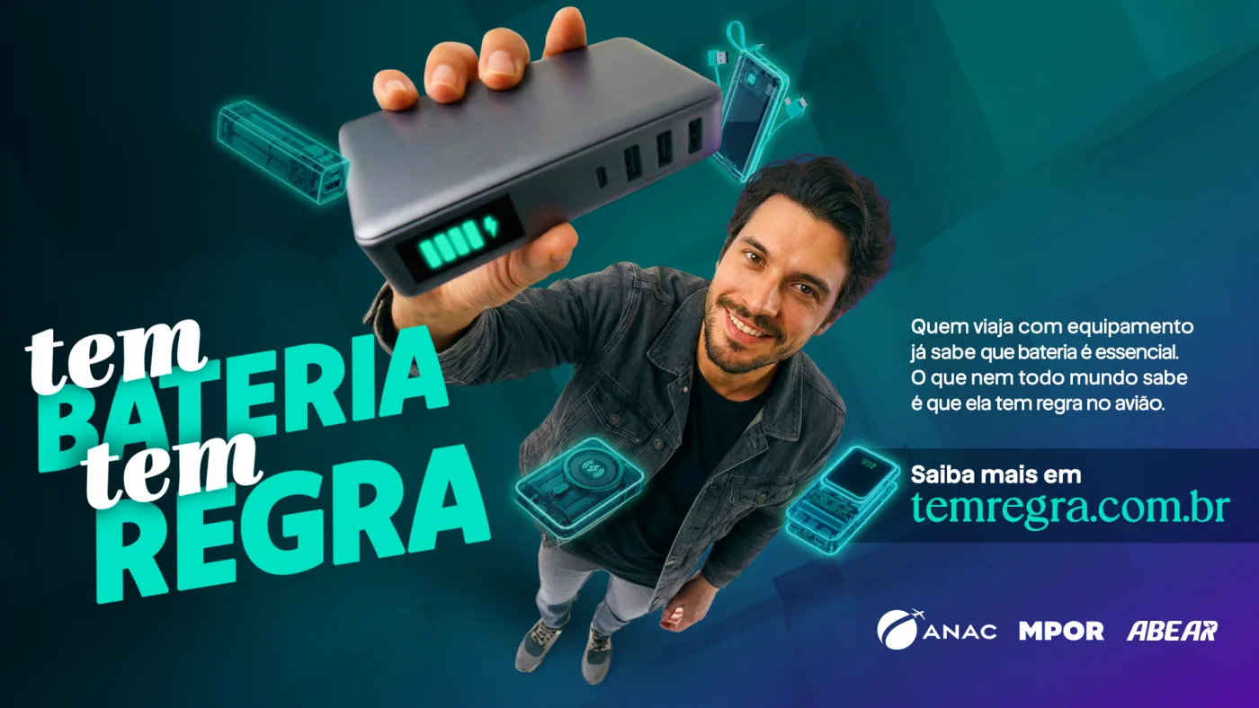 Anúncio Tem Bateria, Tem Regra com passageiro segurando power bank